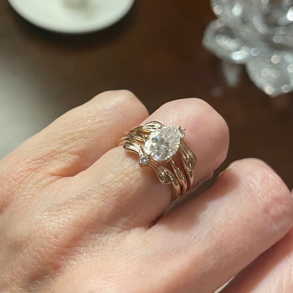 Pear moissanite 1.5 karat ring with 2 bands